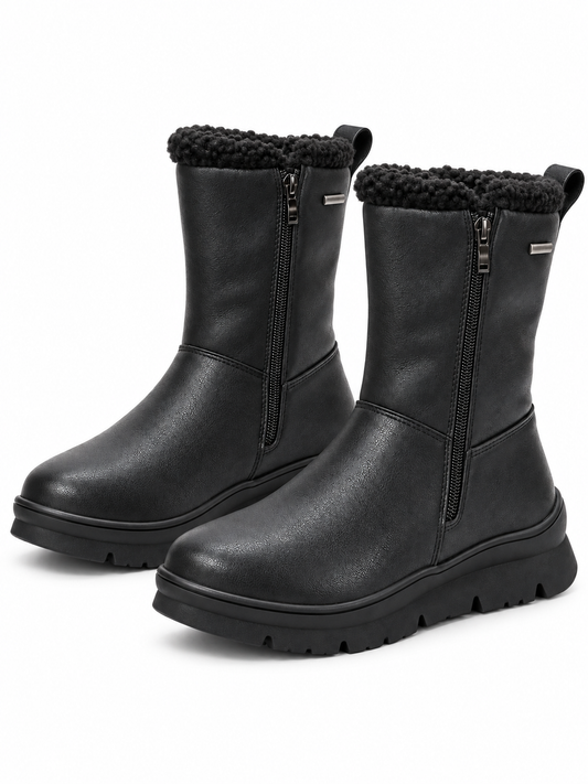 Pareja de botas negras modelo 99078 con forro cálido y suela track