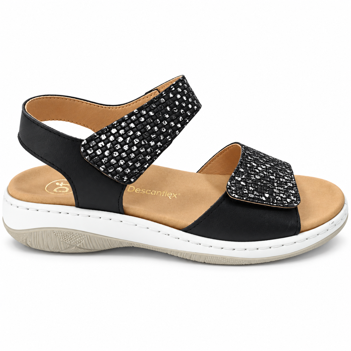 Sandalia Descanflex negra con detalles plateados, horma ancha y plantilla extraíble, vista lateral exterior.